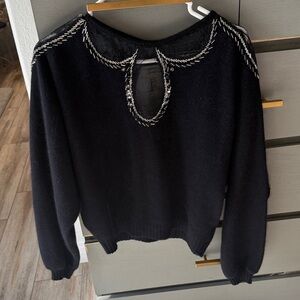 Chic Black Sweater with Accents